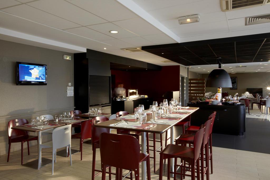 Hotel Campanile Saint-Quentin-En-Yvelines Montigny-le-Bretonneux Restaurante foto